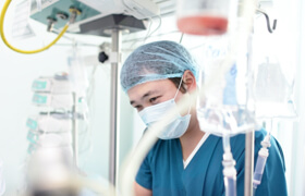 a doctor wearing a surgical masks in the hospital